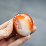 Đá phong thủy cầm tay Carnelian - palm stone, năng lượng tích cực may mắn