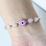 Vòng tay thạch anh hồng và hạt evil eye giúp bảo vệ