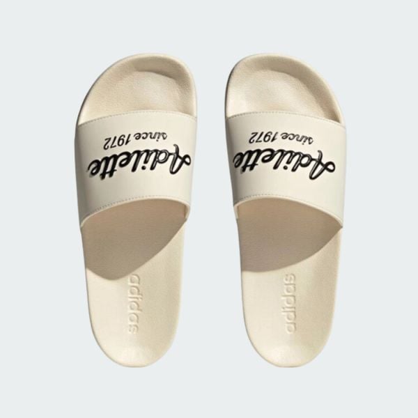 DÉP ADIDAS ADILETTE SINCE 1972 MÀU TRẮNG NGÀ GZ9510