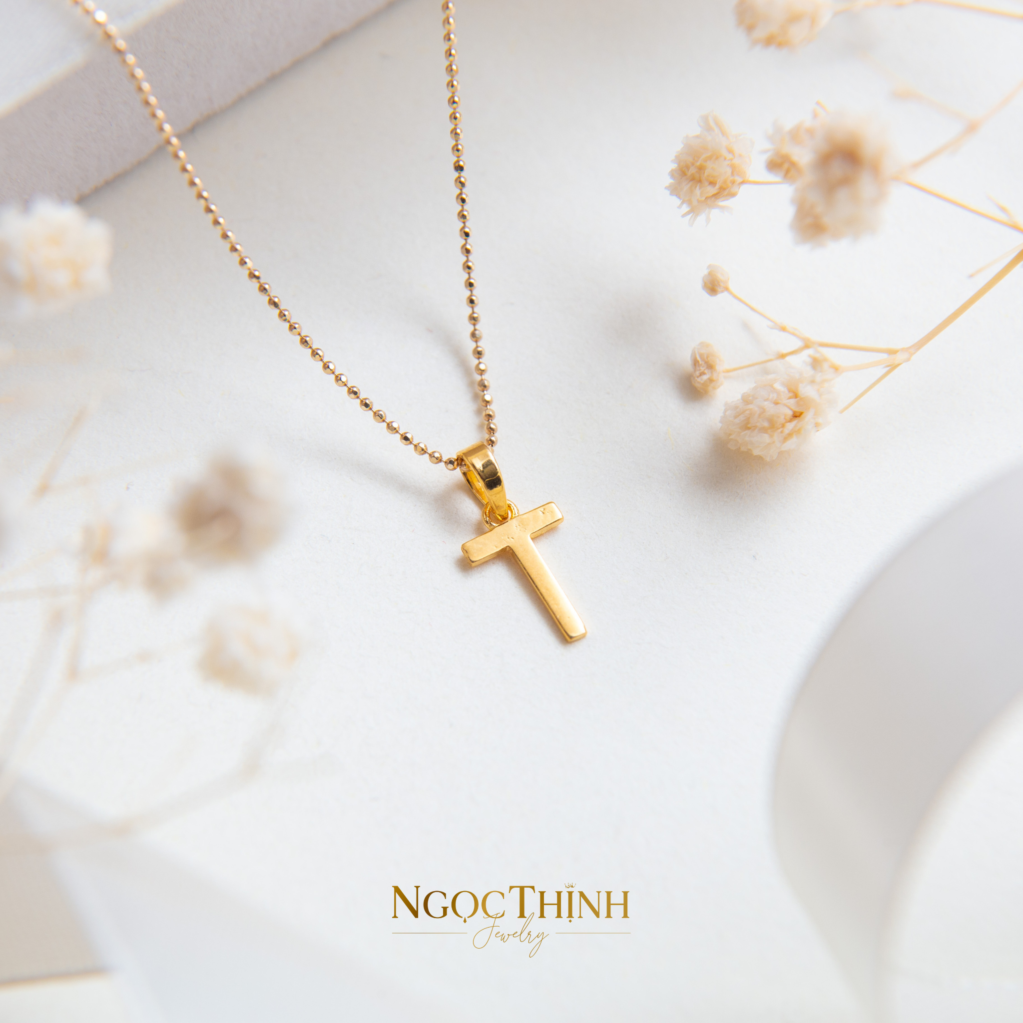 Mặt dây chữ T