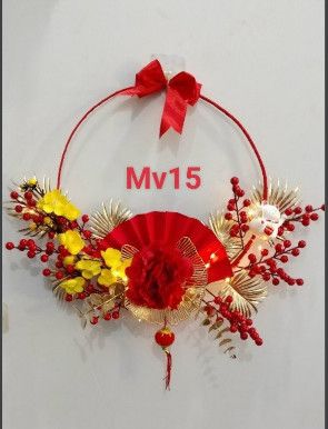 VÒNG HOA TẾT ĐÀO ĐÔNG VÀ QUẠT MAY MẮN