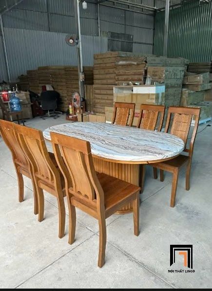 bộ bàn ăn mặt đá oval sang trọng