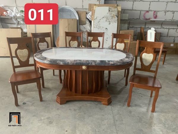 bộ bàn ăn mặt đá oval cao cấp