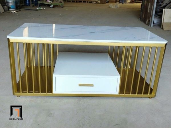 bàn trà mặt đá khung chân sắt vàng