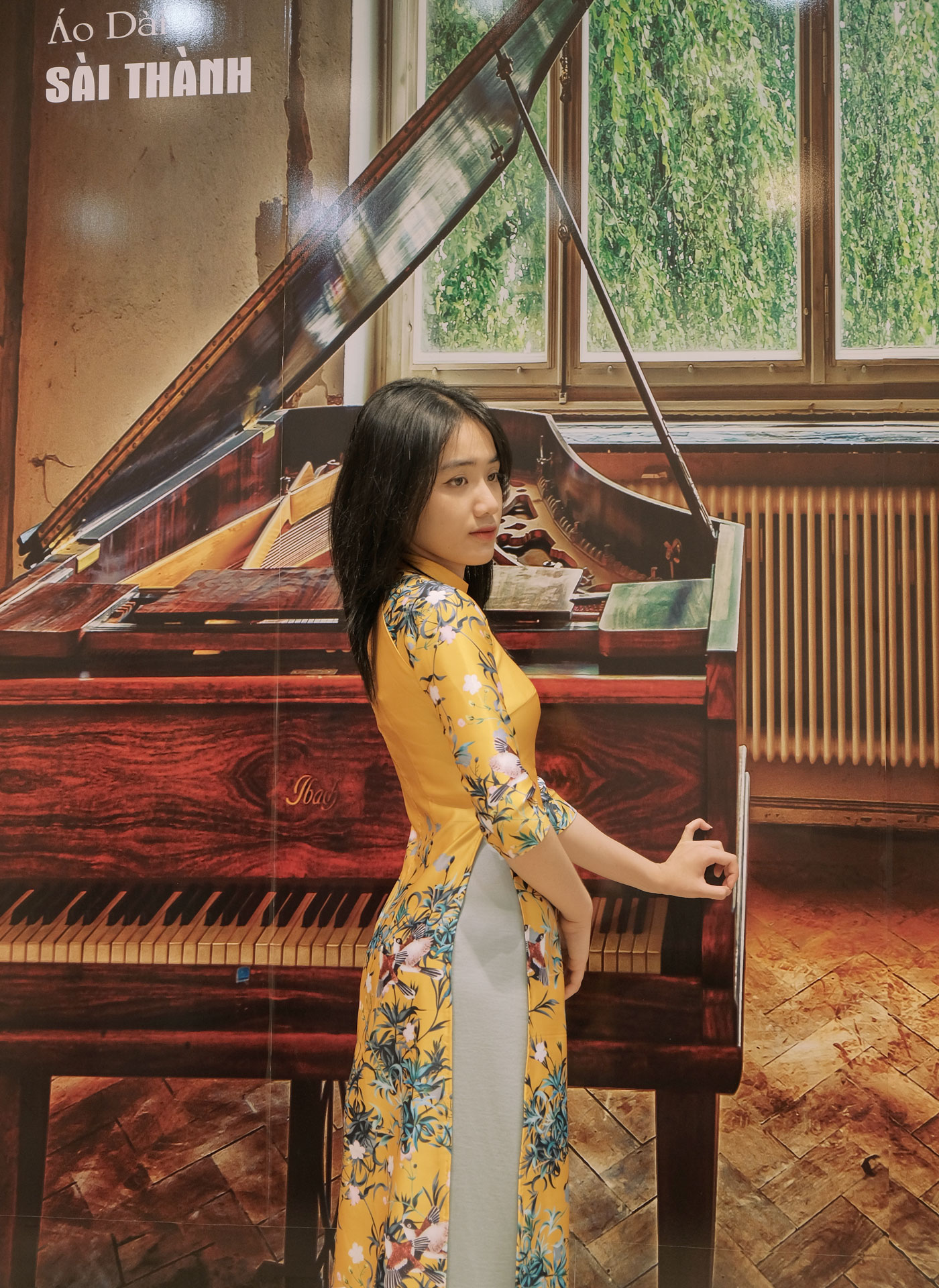 TT0001- Áo dài tapta vàng họa tiết mùa xuân