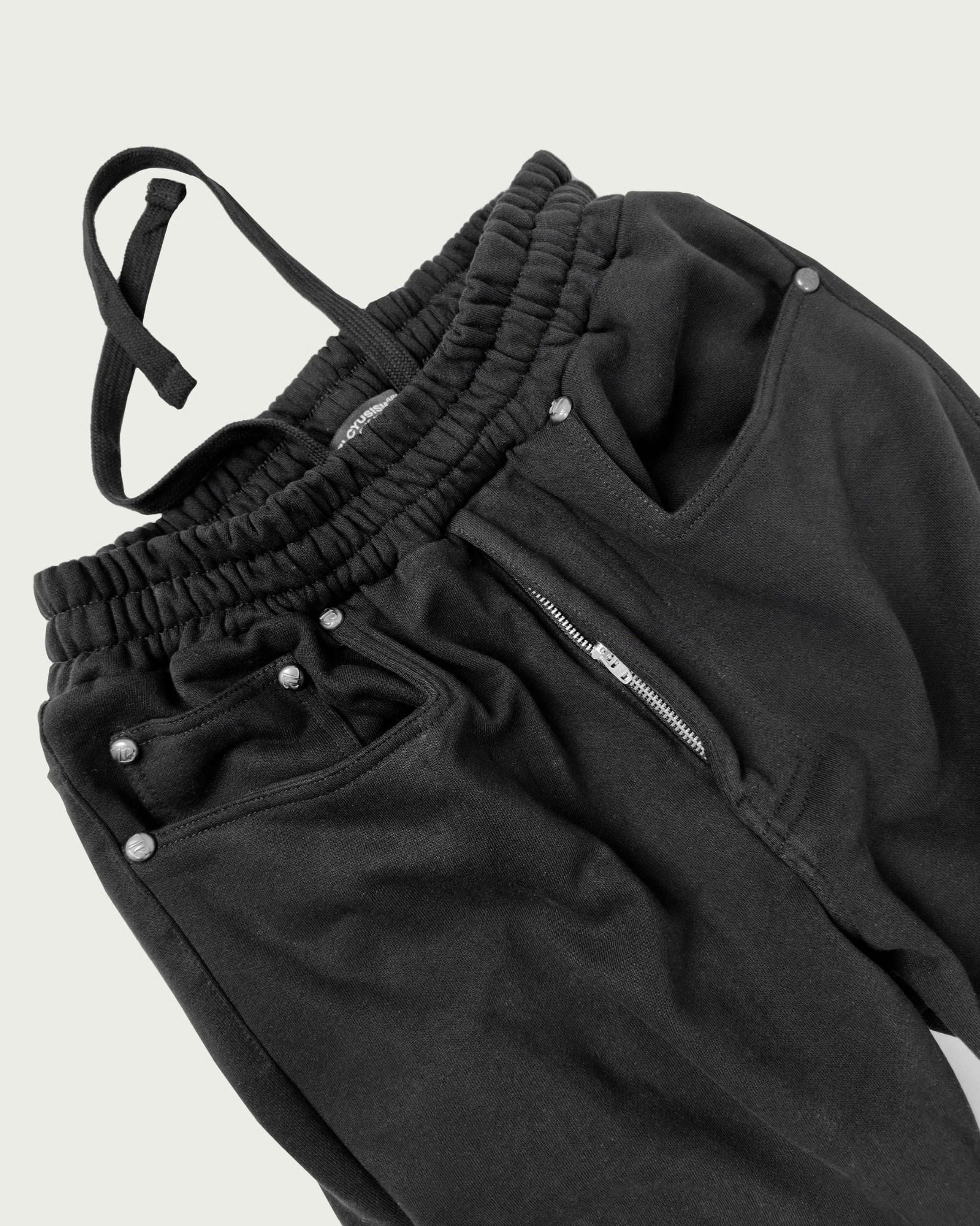  ALCYUS | A25 RIVET SWEAT PANTS 
