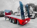 Xe Chenglong H7 nâng đầu chở máy