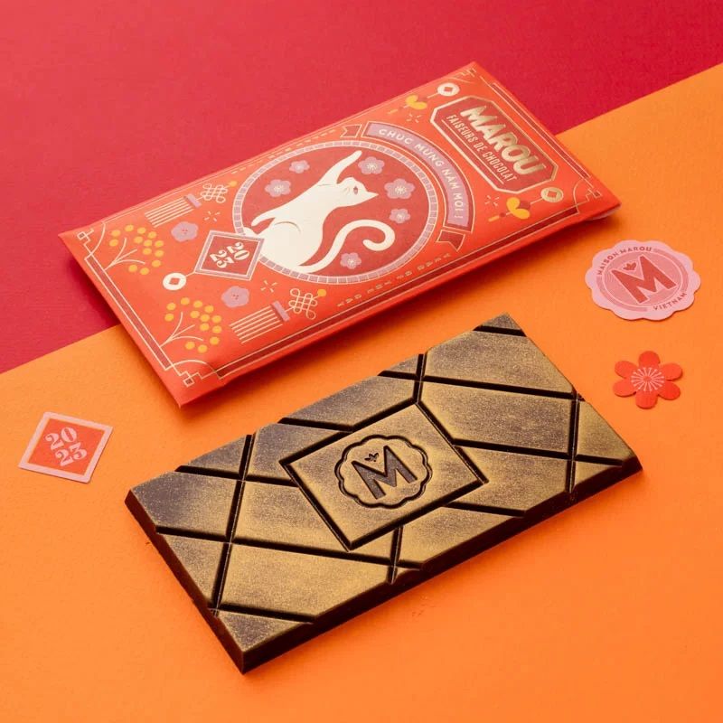  SÔ-CÔ-LA ĐEN 70% VỊ CAM THẢO PHỦ VÀNG (80G) 