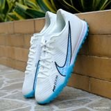  Giày Bóng Đá Cỏ Nhân Tạo Mercurial Vapor 15 Academy SF Trắng Đế Xanh Da TF 