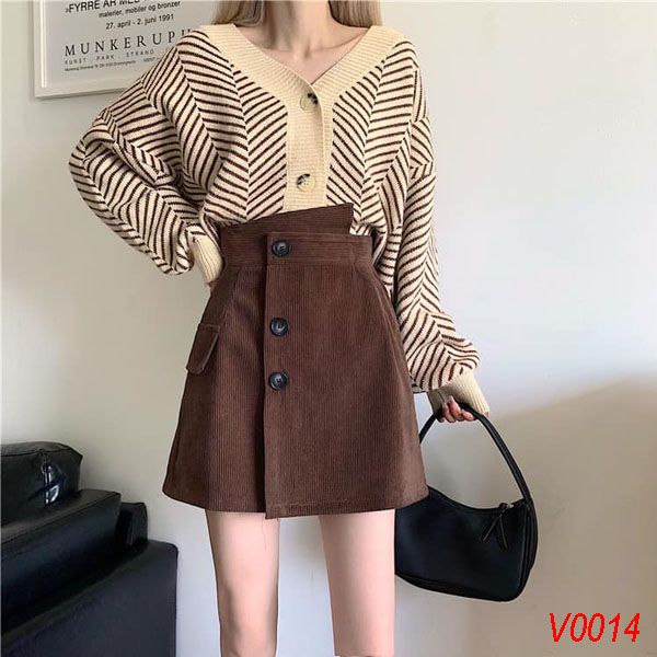 Chân váy nhung xanh xếp ly