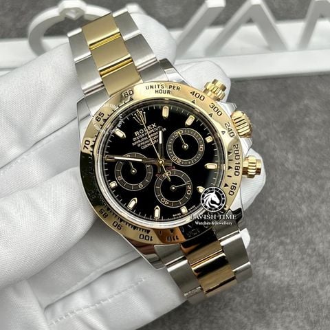 Đồng Hồ Rolex Cosmograph Daytona 116503-0004 Rep 1:1 Chế Tác Vỏ Demi Vàng Khối Mặt Đen Dây Kim Loại