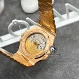 Đồng Hồ Patek Philippe Nautilus 5712R-001 Rep 1:1 Chế Tác Vỏ Vàng Khối 18K Mặt Nâu Dây Kim Loại