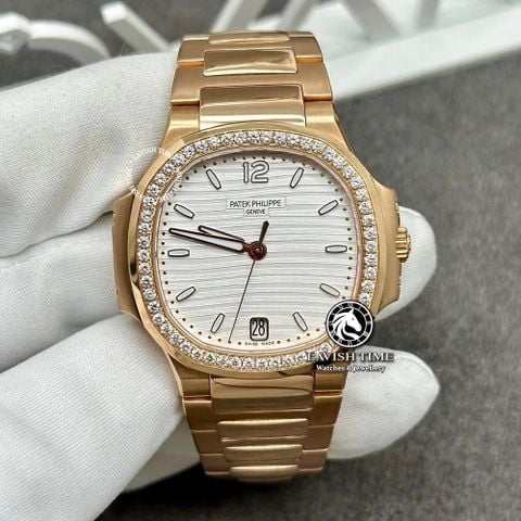 Đồng Hồ Patek Philippe Nautilus 7118/1200R-001 Rep 1:1 Chế Tác Vỏ Vàng Khối 18K Niềng Bezel Độ Kim Cương Thiên nhiên Mặt Trắng Dây Kim Loại