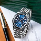 Đồng Hồ Rolex Sky-Dweller 42mm 336934-0005 Rep 1:1 Chế Tác Vỏ Bạc Mặt Xanh Dương Dây Kim Loại Oyster