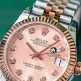 Đồng Hồ Rolex Datejust 31mm m278271-0024 Rep 1:1 Chế Tác Mặt Hoa Hồng Niềng Khía Dây Demi Vàng Hồng Jubilee 5 mắt