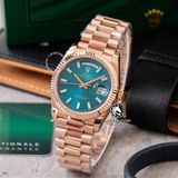 Đồng Hồ Rolex Day-Date 36mm 128235-0085 Rep 1:1 Chế Tác Mặt Số Xanh Lục Lam Cọc Số Đính Đá Baguette Vàng Hồng Khối Lượng 160 Gram