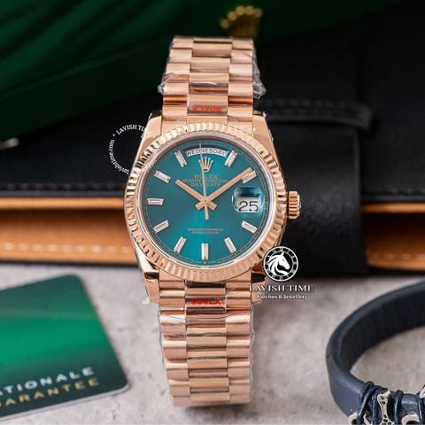 Đồng Hồ Rolex Day-Date 36mm 128235-0085 Rep 1:1 Chế Tác Mặt Số Xanh Lục Lam Cọc Số Đính Đá Baguette Vàng Hồng Khối Lượng 160 Gram