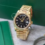 Đồng Hồ Rolex Day-Date 40mm 228238-004 Rep 1:1 Chế Tác Vỏ Vàng Kim Mặt Đen Cọc Số Đính Đá Baguette Trọng Lượng 168 Gram Dây Kim Loại
