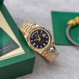 Đồng Hồ Rolex Day-Date 40mm 228238-004 Rep 1:1 Chế Tác Vỏ Vàng Kim Mặt Đen Cọc Số Đính Đá Baguette Trọng Lượng 168 Gram Dây Kim Loại
