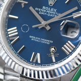 Đồng Hồ Rolex Day-Date 40mm 228239-007 Rep 1:1 Chế Tác Vỏ Bạc Mặt Xanh Dương Cọc Số La Mã Trọng Lượng 168 Gram Dây Kim Loại