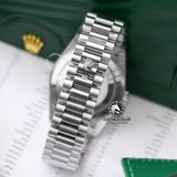 Đồng Hồ Rolex Day-Date 40mm 228239-007 Rep 1:1 Chế Tác Vỏ Bạc Mặt Xanh Dương Cọc Số La Mã Trọng Lượng 168 Gram Dây Kim Loại