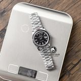 Đồng Hồ Rolex Day-Date 40mm 228239-005 Rep 1:1 Chế Tác Vỏ Bạc Mặt Đen Cọc Số Đính Đá Trọng Lượng 168 Gram Dây Kim Loại