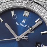 Đồng Hồ Hublot Classic Fusion 42mm Rep 1:1 Chế Tác Vỏ Bạc Đính Đá Pave Mặt Số Xanh Dương Chải Tia 581.NX.7170.LR