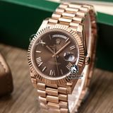 Đồng Hồ Rolex Day-Date 40mm 228235 Rep 1:1 Chế Tác Vỏ Vàng Hồng Mặt Nâu Chocolate Cọc Số La Mã Trọng Lượng 168 Gram Dây Kim Loại