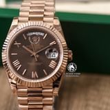 Đồng Hồ Rolex Day-Date 40mm 228235 Rep 1:1 Chế Tác Vỏ Vàng Hồng Mặt Nâu Chocolate Cọc Số La Mã Trọng Lượng 168 Gram Dây Kim Loại