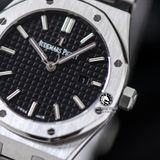 Đồng Hồ Audemars Piguet Royal Oak 67650ST.OO.1261ST.01 Rep 1:1 Chế Tác Vỏ Bạc Mặt Đen Dây Kim Loại