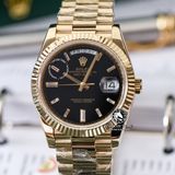Đồng Hồ Rolex Day-Date 40mm 228238-004 Rep 1:1 Chế Tác Vỏ Bọc Vàng 18K Mặt Đen Cọc Số Đính Đá Baguette Dây Kim Loại