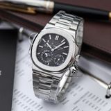 Đồng Hồ Patek Philippe Nautilus 5712G-001 Rep 1:1 Chế Tác Vỏ Bạc Mặt Xám Dây Kim Loại
