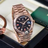 Đồng Hồ Rolex Day-Date II 41mm 218235-BLKDFP Rep 1:1 Cao Cấp Vỏ Vàng Hồng Mặt Đen Cọc Số Đính Đá Baguette Và Đá Ruby Đỏ Dây Kim Loại