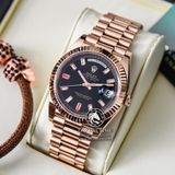 Đồng Hồ Rolex Day-Date II 41mm 218235-BLKDFP Rep 1:1 Cao Cấp Vỏ Vàng Hồng Mặt Đen Cọc Số Đính Đá Baguette Và Đá Ruby Đỏ Dây Kim Loại