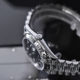 Đồng Hồ Rolex Day-Date 40 228239-0005 Rep 1:1 Cao Cấp Vỏ Bạc Mặt Đen Cọc Số Đính Đá Baguette Dây Kim Loại