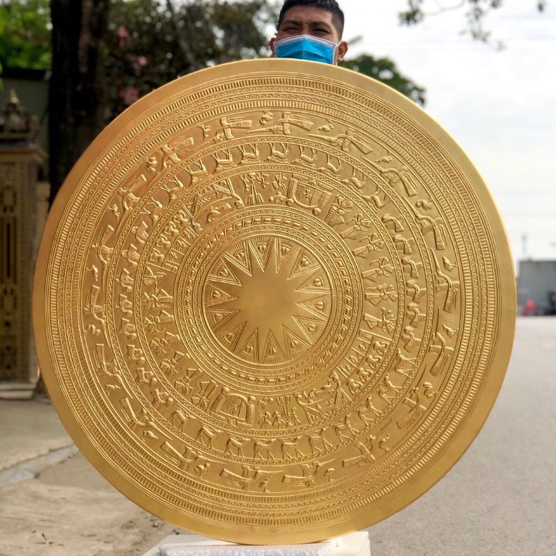 mat trong dong dong go thep vang 24k duong kinh 1m