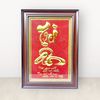 tranhquatangchutrianbangdongvangkichthuoc28x38cmxuongtranhdong