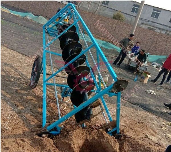 Máy khoan đất Kawasaki 15HP