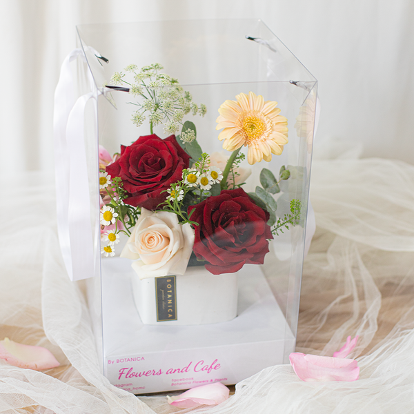  Red roses in ceramic vase 