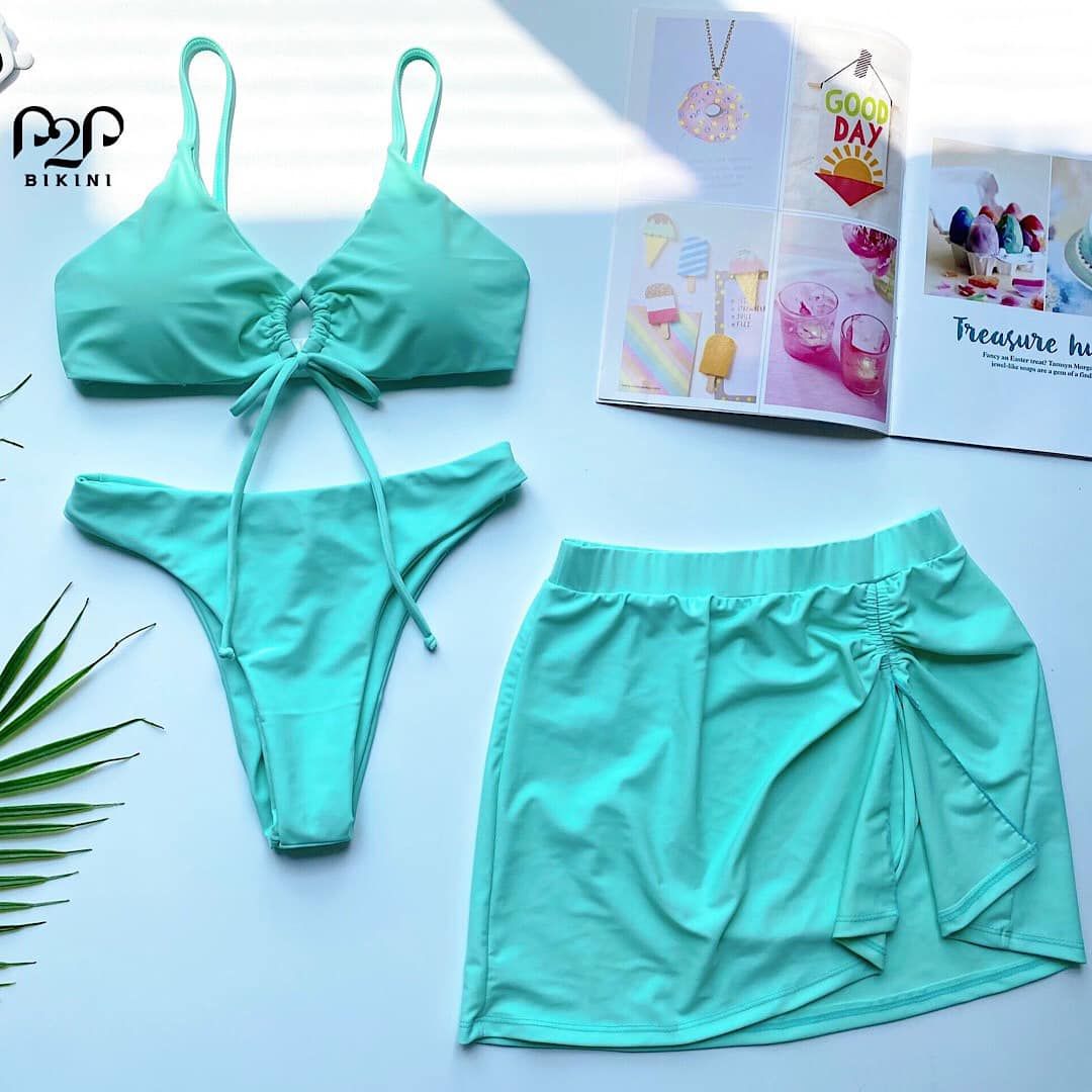 Set bikini 2 mảnh kèm váy xanh ngọc