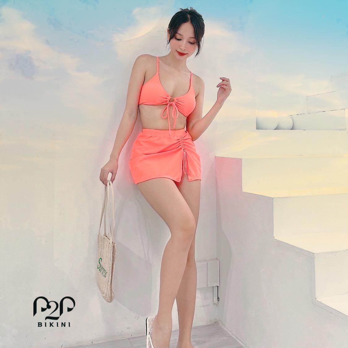 Set bikini 2 mảnh kèm váy cam sữa