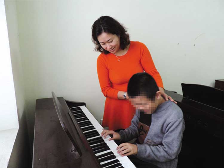 hoc piano chua benh tu ky cho tre