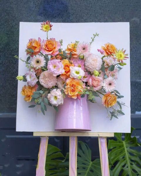 Mẫu hoa màu cam thể hiện nhiệt huyết, niềm vui và sự sáng tạo: toa-lac-gt24-ke-hoa-khai-truong