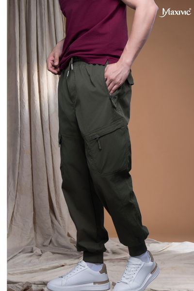 Quần nam kaki xanh rêu túi hộp ống bo thun