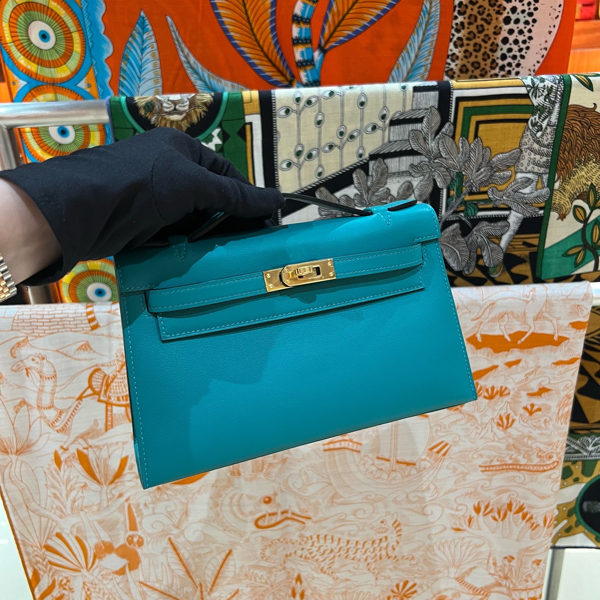 Hermes Kelly Pochette Swift Bleu Paon in Swift Leather with Gold