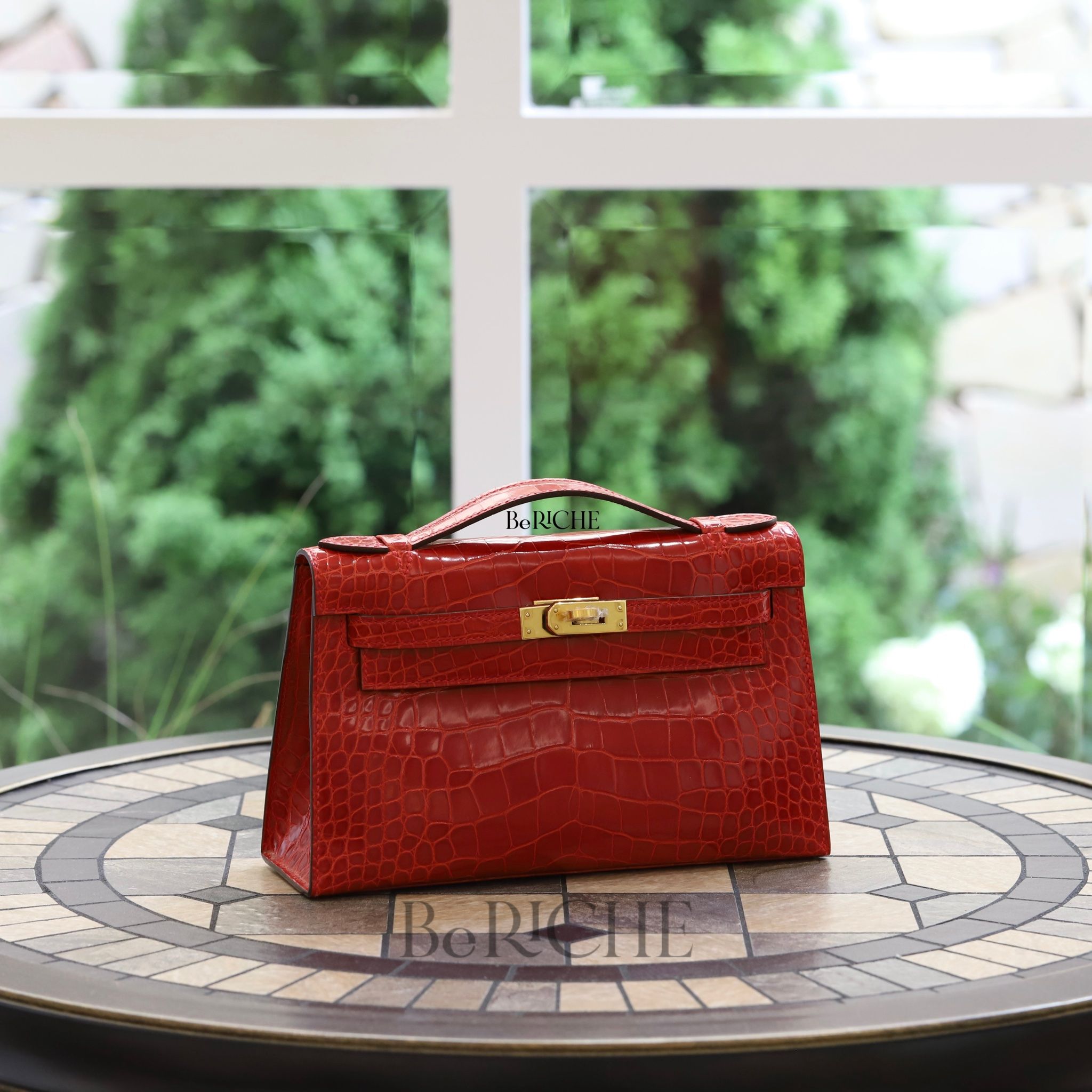 Kelly pochette crocodile price hot sale
