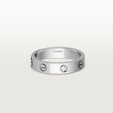  Carrtier love ring, 1 diamond 