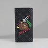Ví dài Louis Vuitton Monogram Eclipse Space Age Brazza