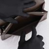 Clutch Louis Vuitton Belaia Taiga size 24 - TTA4583