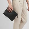 Clutch Louis Vuitton Pochette Voyage MM Noir Taiga (Đen) - TTA5129